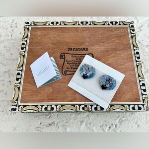 Vintage Lee Sands mother of pearl lion head earrings